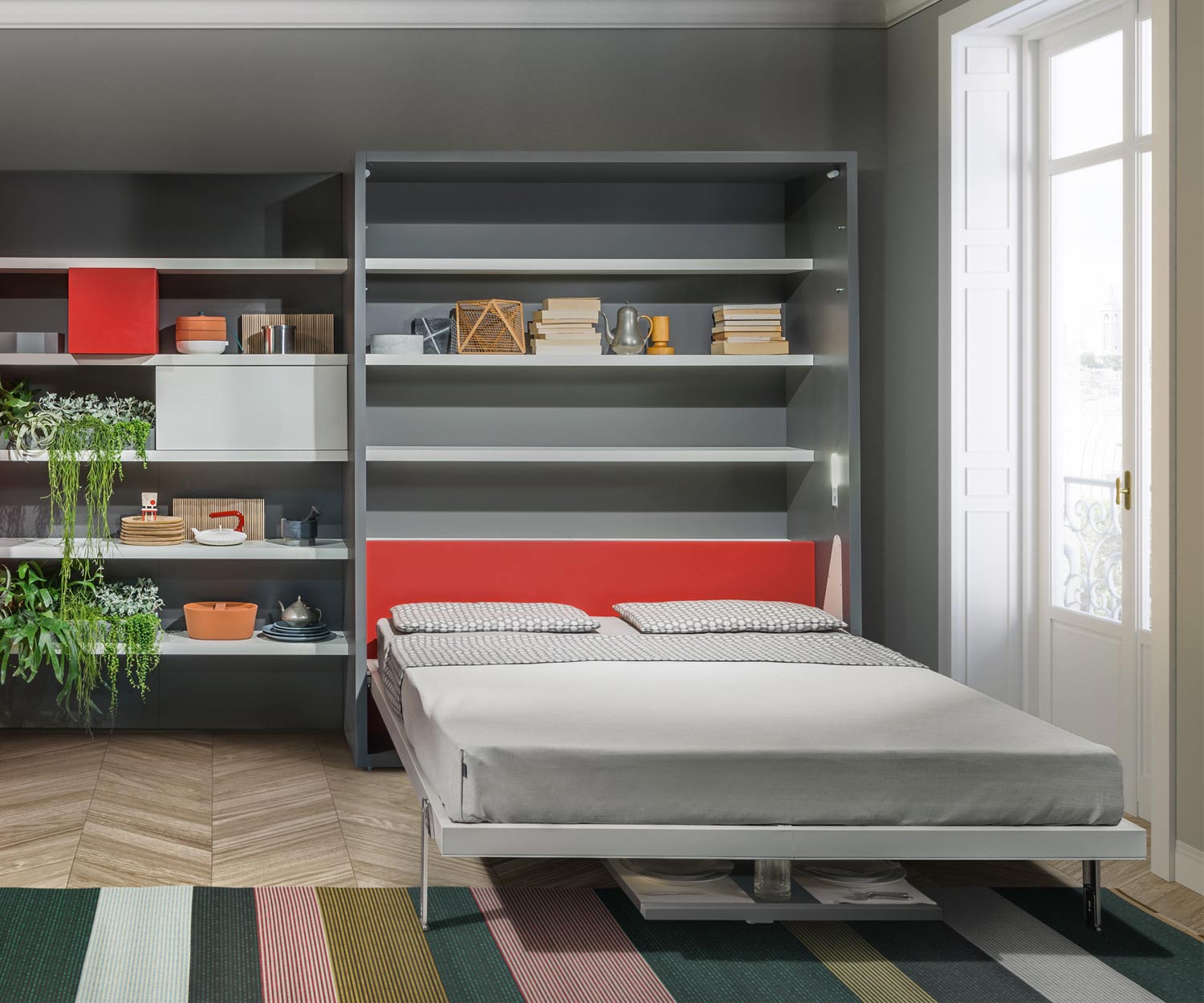 Le lit escamotable Clei Penelope 2 avec table à manger est idéal pour les studios
