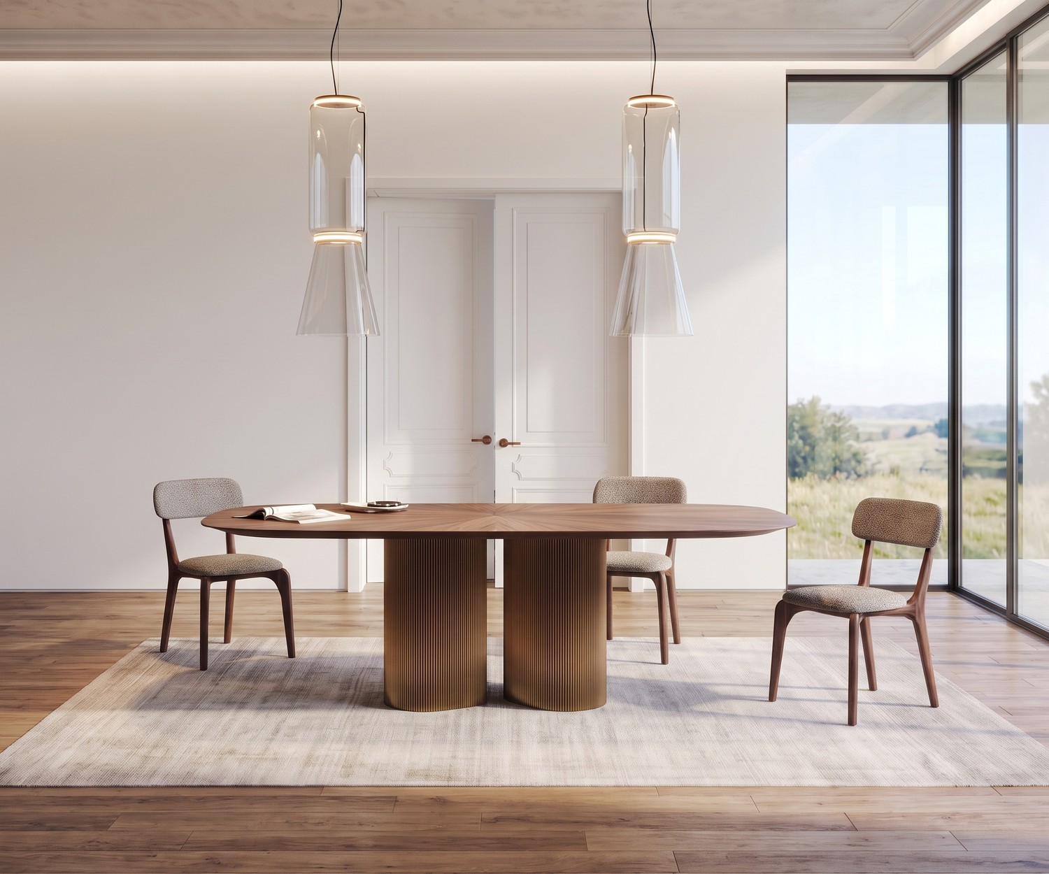 Table à manger ovale al2 dakry b 001 en bois avec double piétement en métal doré dans une salle à manger épurée.