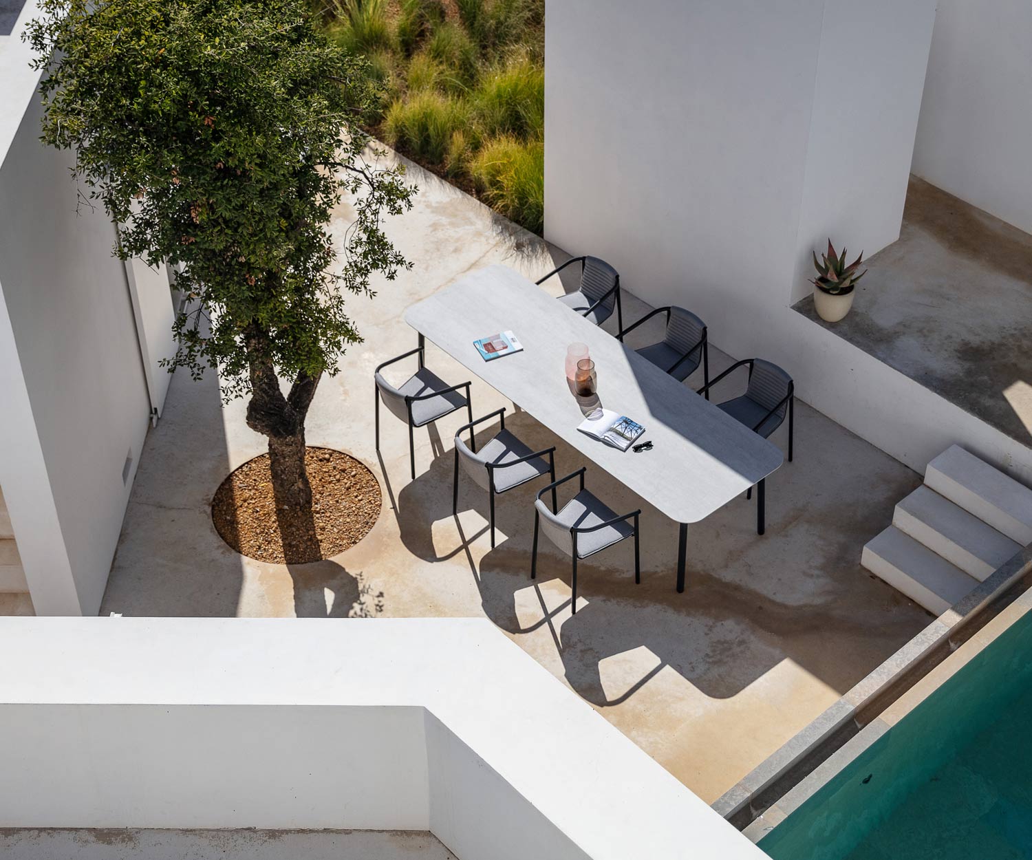 Chaise à accoudoirs de haute qualité Todus Duct Round Design sur la terrasse Chaise à accoudoirs de haute qualité Todus Duct Round Design sur la terrasse