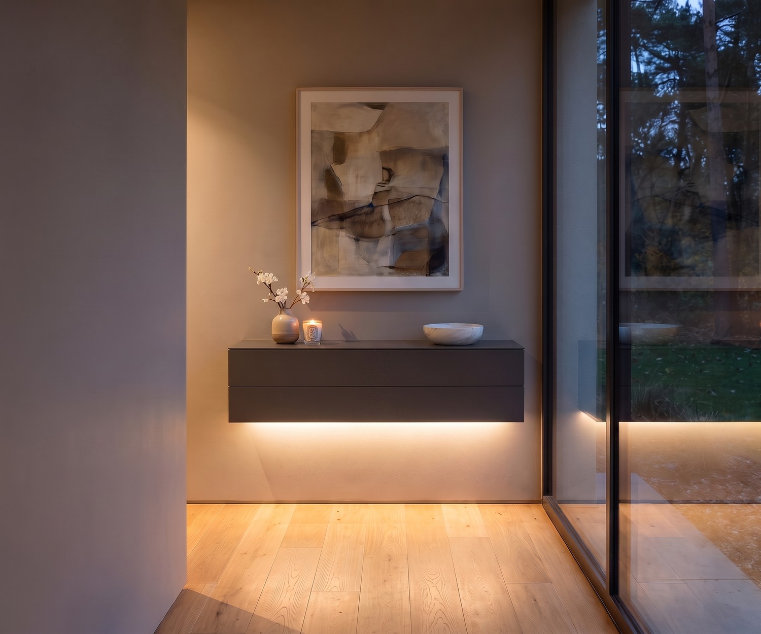 Commode suspendue Novamobili Easy à 2 tiroirs dans une entrée avec miroir rond, lampe design et déco épurée.
